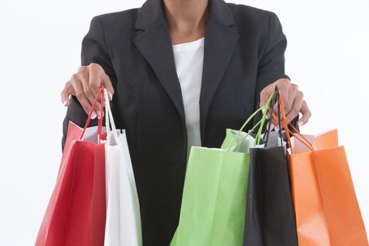 Shopper woman holding shopping bags.