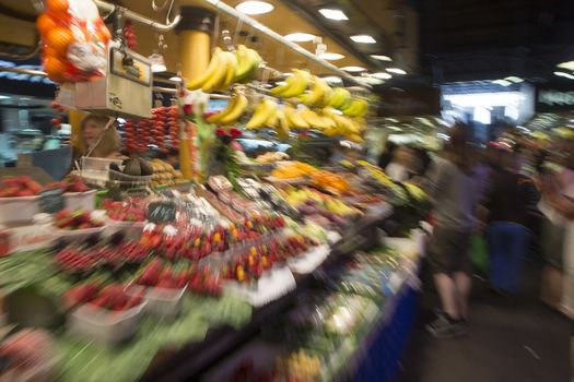 blurry image of fruit and vegetables  in the market