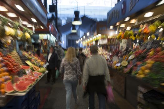 blurry image of fruit and vegetables  in the market