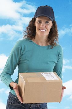 Woman courier smiling happy delivering parcel