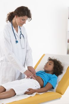 Image of pediatrician doing abdominal examination