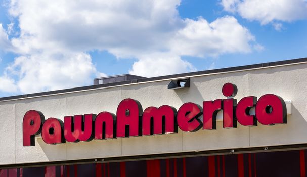 HOPKINS, MN/USA - AUGUST 11, 2015: PawnAmerica exterior and sign. PawnAmerica is a chain of pawn shops in the United States.
