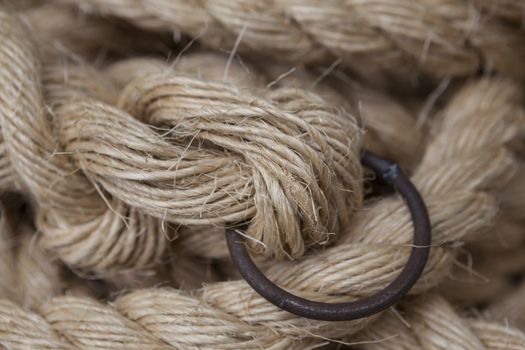 Coil of rope with a marine unit, and an iron ring