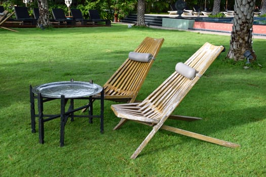 table and chair on lawn