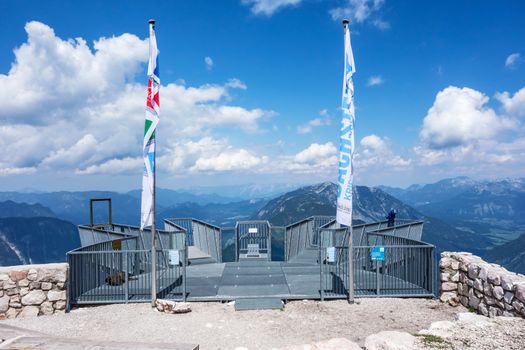Obertraun, Austria - June 27, 2014: Viewing platform - view of mountains over the railing from the "five fingers" observation deck, Obertraun, Austria