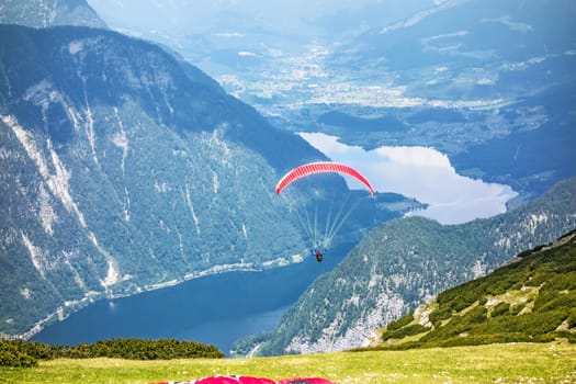 Paraglider at the sky over the Dachstein mountains
