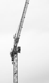 Tower crane isolated on gray background