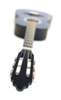 Black Wooden Classical Acoustic Guitar Isolated on a White Background