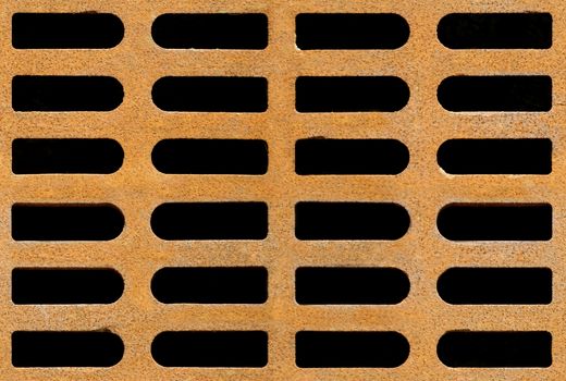 Rusty drain grate background texture, seamlessly tileable