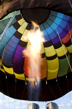 Flames from a burner inside a hot-air balloon envelop. This is how a balloon acheives lift