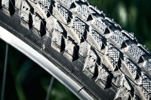 Close up macro image of bicycle tire. Sport conceptual image.