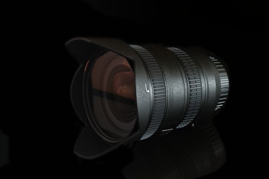 Digital camera zoom lens isolated on black