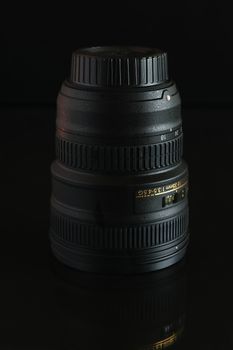 Digital camera zoom lens isolated on black