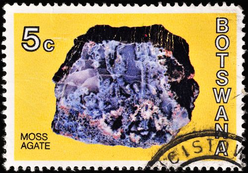 Stockholm, Sweden - Februari 19, 2013: BOTSWANA - CIRCA 1975: A stamp printed in Botswana shows image of the mineral chrysotile, series, circa 1975.