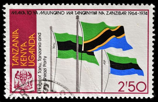 KENYA - CIRCA 1974: stamp printed in Kenya, shows flags of Tanu, Tanzania and Afro-shirazi Party, circa 1974.