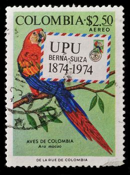 COLOMBIA - CIRCA 1976: A Stamp printed in Colombia shows a bird, Ara Macoa, circa 1976