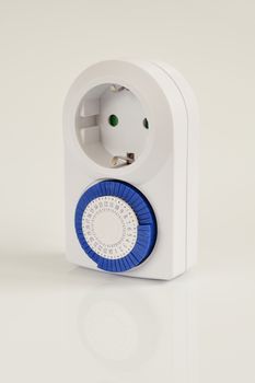 White electric timer on isolated background.