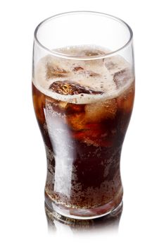 Malta soda (soft drink) in a glass with ice. Lightly carbonated malt beverage, brewed from barley and hops. Also known as Malzbier, malztrunk,kinderbier.
