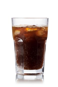 Malta soda (soft drink) in a glass with ice. Lightly carbonated malt beverage, brewed from barley and hops. Also known as Malzbier, malztrunk,kinderbier.