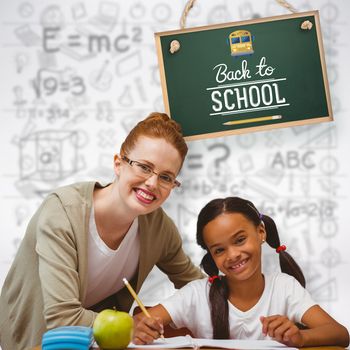 Happy pupil and teacher against grey background
