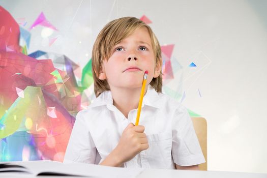 Cute pupil thinking against colourful abstract design