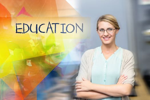 The word education against confident female teacher in computer class