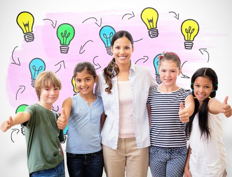 Cute pupils and teacher smiling at camera in computer class  against white background with vignette