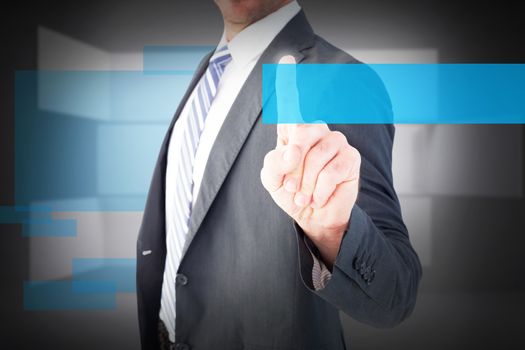 Businessman pointing with his finger against abstract room