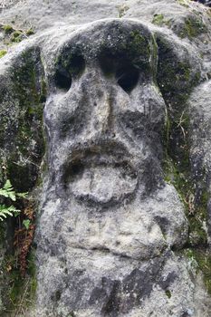 Scary Stone Head - rock sculpture in the forest from 1840 by sculptor Vaclav Levy