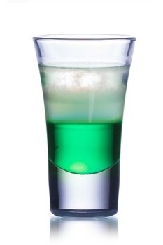 Alcoholic cocktail in shot glass isolated on white
