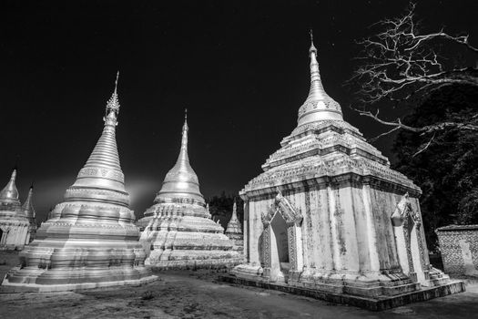 Ancient temple close to Pindaya Cave located next to the town of Pindaya, Shan State, Burma, Myanmar,  Famous buddhist pilgrimage site and a tourist attraction. Black and white image.