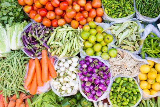 Farmers market with various domestic colorful fresh fruits and vegetable. Tasty colorful mix.