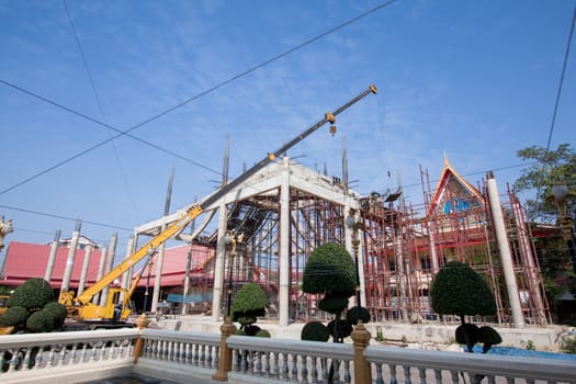 Construction site with crane and building