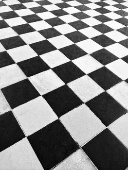 Black and white ceramic tile floor background.