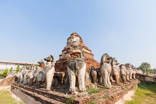 Ruins lion statue in Ayutthaya Historical Park, Thailand