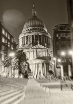 Blurred image of St Paul Cathedral at night, London.
