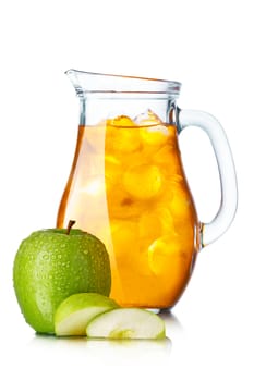 Apple juice with ice in a pitcher. Jug full of iced apple mixed drink.