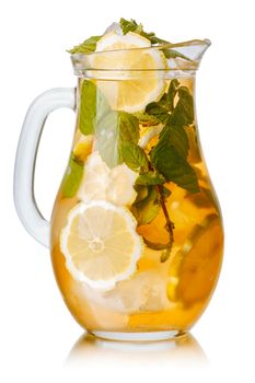 Pitcher of sweet iced tea with lemon and mint.