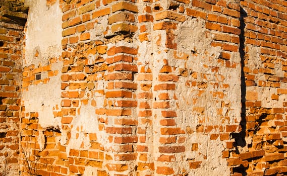   the old brick wall collapsing eventually