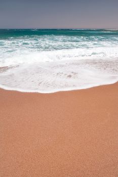 Sea wave and sand on the beach
