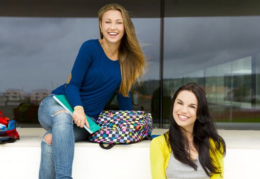 Beautiful and happy teenage students in the school