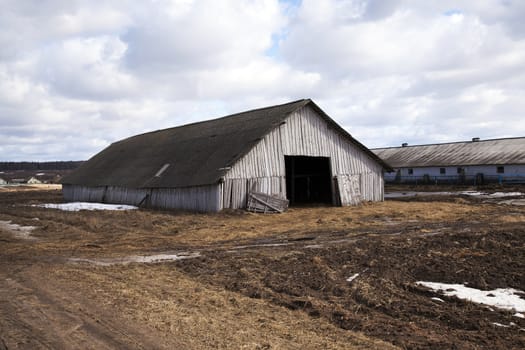  old wooden shed in which pets (cowshed) took place