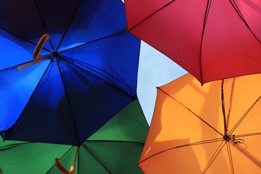 many umbrellas above hanging in air