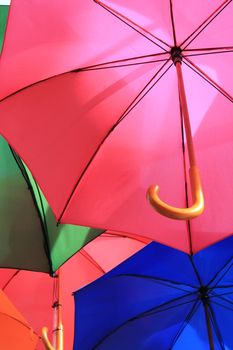 many umbrellas above hanging in air