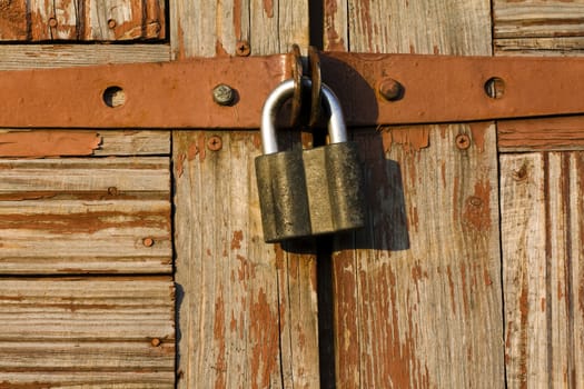 metal lock located on the wooden door