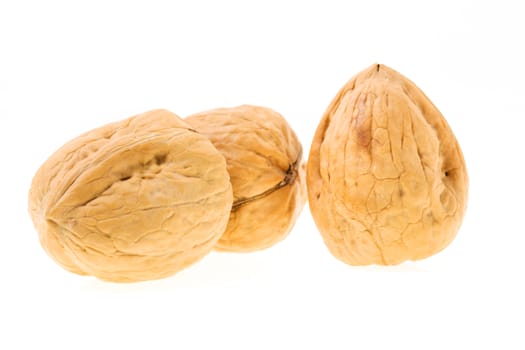 walnuts are isolated on white. a close up