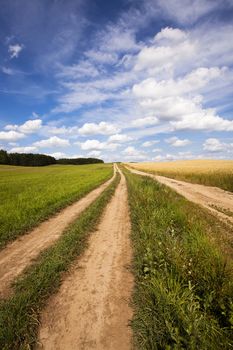  two not asphalted rural roads which are passing nearby