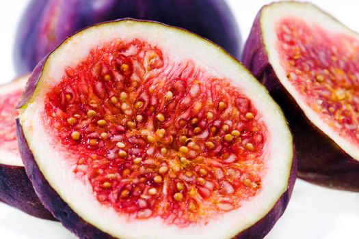 red ripe figs, photographed in close-up. cut