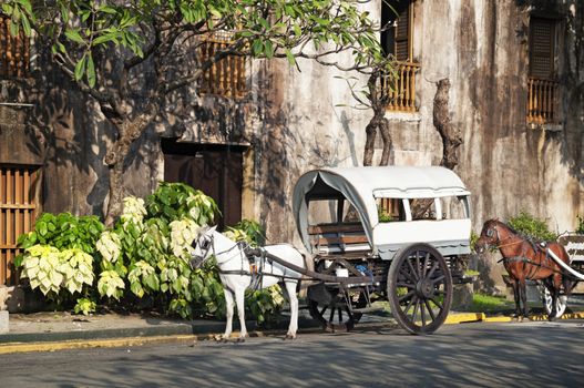 Horse Drawn Calesas waiting for tourists  in Intramuros, a historical part of Manila.