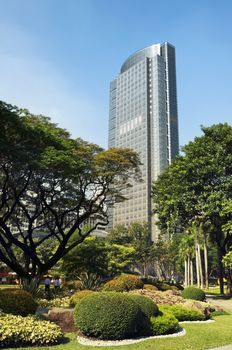 Ayala Tower One view from Ayala Triangle Gardens. It its one of the tallest building in the Philippines, (160 metres (525 feet)),  home of the Philippine Stock Exchange.